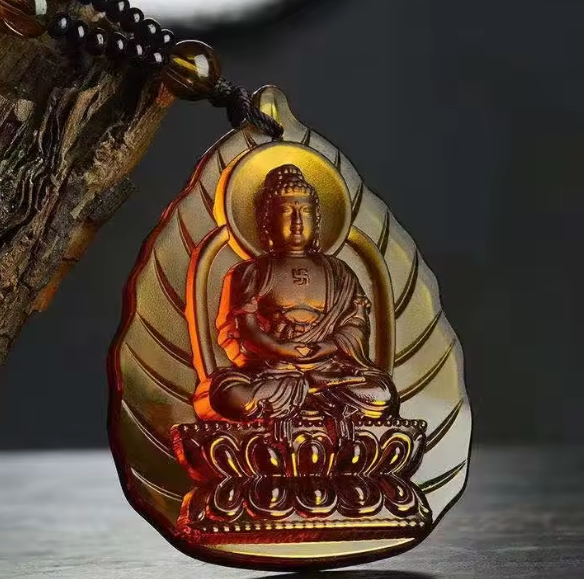 Pendentif Bouddha tibétain en cristal – Symbole de lumière et de sérénité