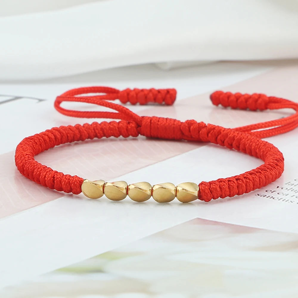Bracelet tibétain bouddhiste – Cordon tressé et perles en cuivre