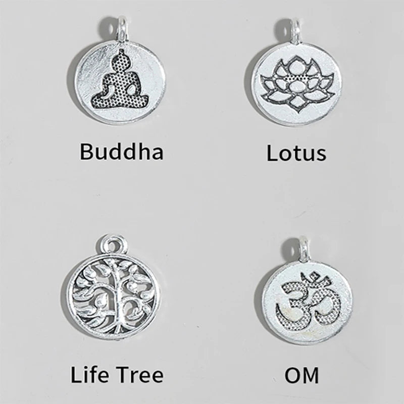 Quatre breloques argentées disponibles pour ce bracelet mala : Bouddha, Lotus, Arbre de Vie et OM