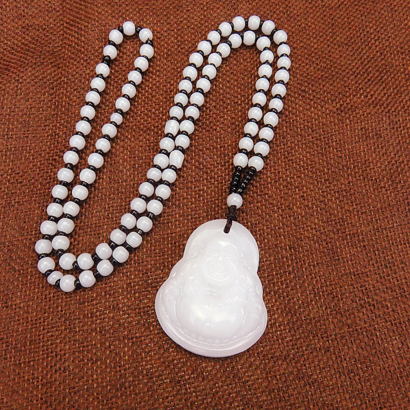 Pendentif Bouddha tibétain – Sagesse et protection en verre sculpté