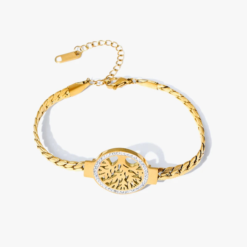 Bracelet Arbre de Vie en acier doré à maillons tressés et strass, présenté sur fond blanc avec chaînette d'extension