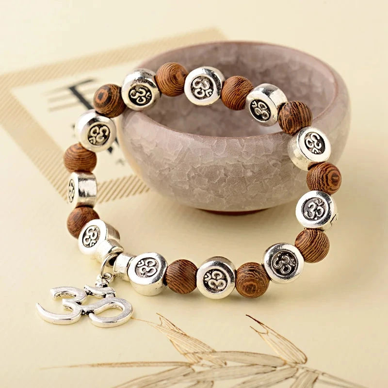 Bracelet Bouddha OM – Perles de Bois Sacré Esprit Tibet 