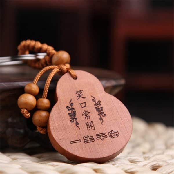 Porte-clés Bouddha en bois Esprit Tibet 